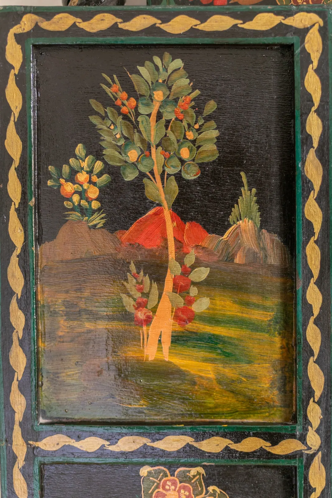 Hand-painted cedar cabinet doors with flowering trees