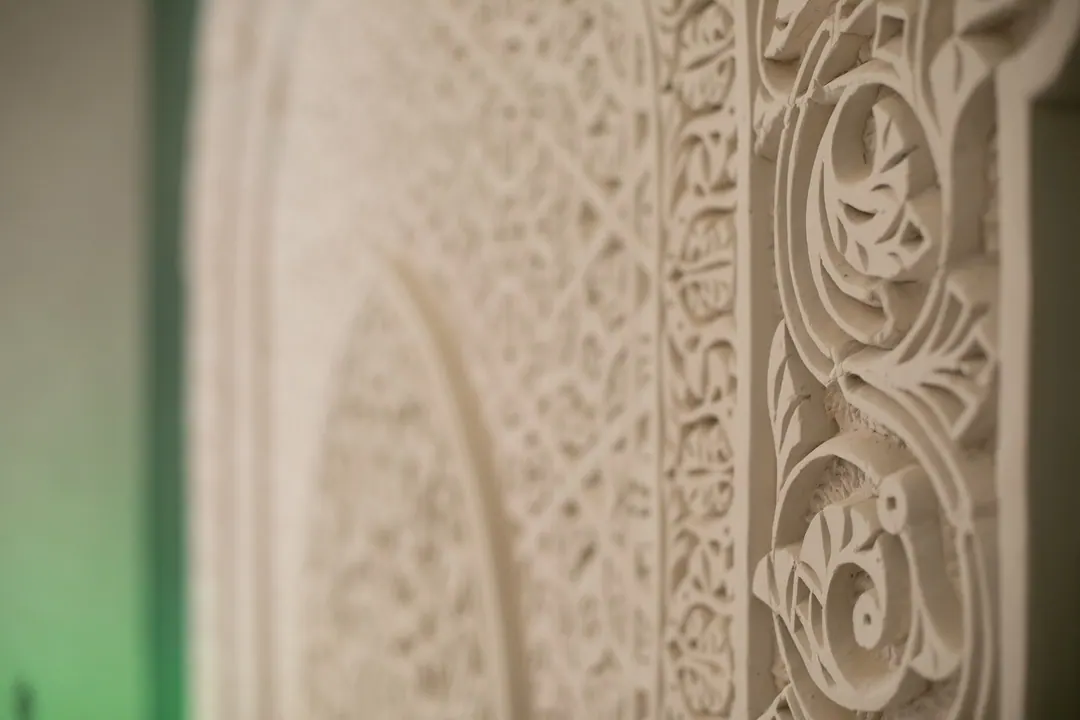 Hand-carved plaster (gebs) headboard detail