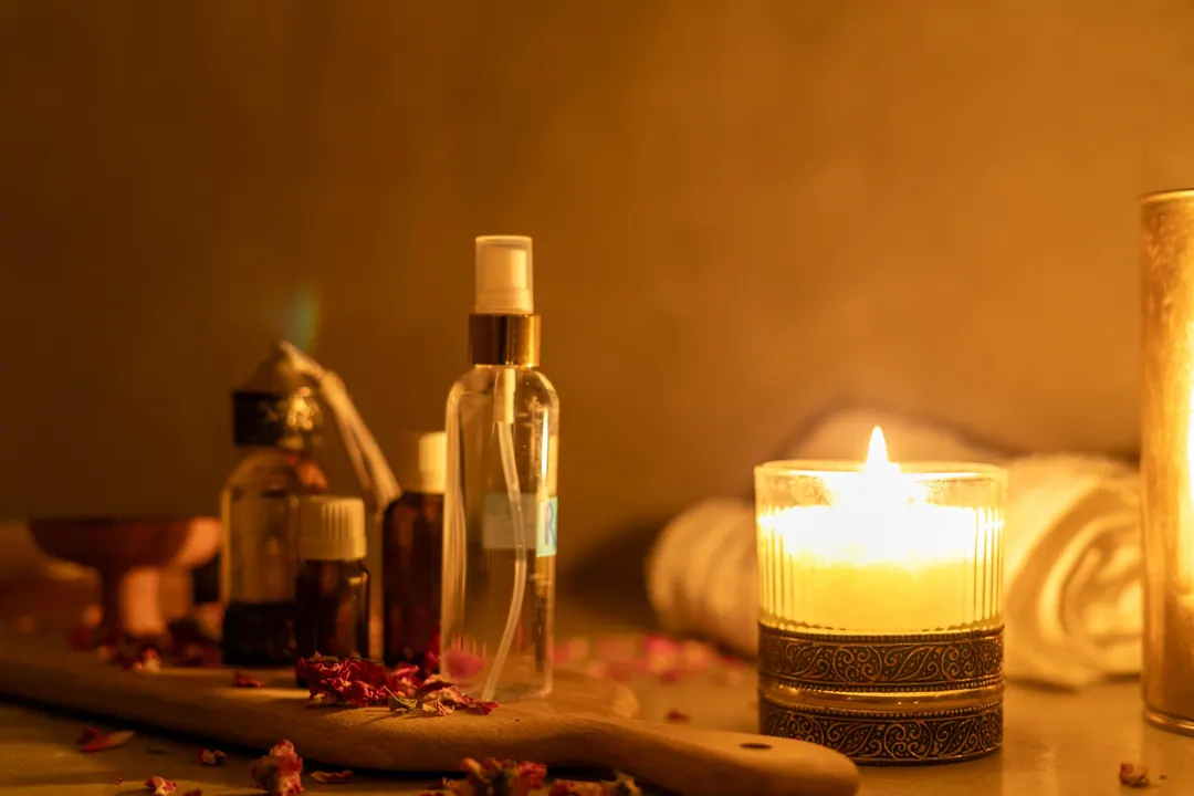Hammam ritual: black soap, argan oil, rose petals and warm towels by candlelight